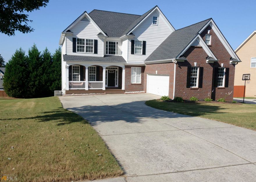Very large home featuring 5 bedrooms, 4 full baths and a 2 car garage. This home has a very spacious kitchen with an island and a dining area. There is also a large dining room and family on the main level. There is a guest bedroom on the main level for your guests. The second level has the master bedroom with a new master shower installed in 2018. New A/C units and a new roof installed. This home is a must see schedule showings with the listing agent (706)983-9988.
