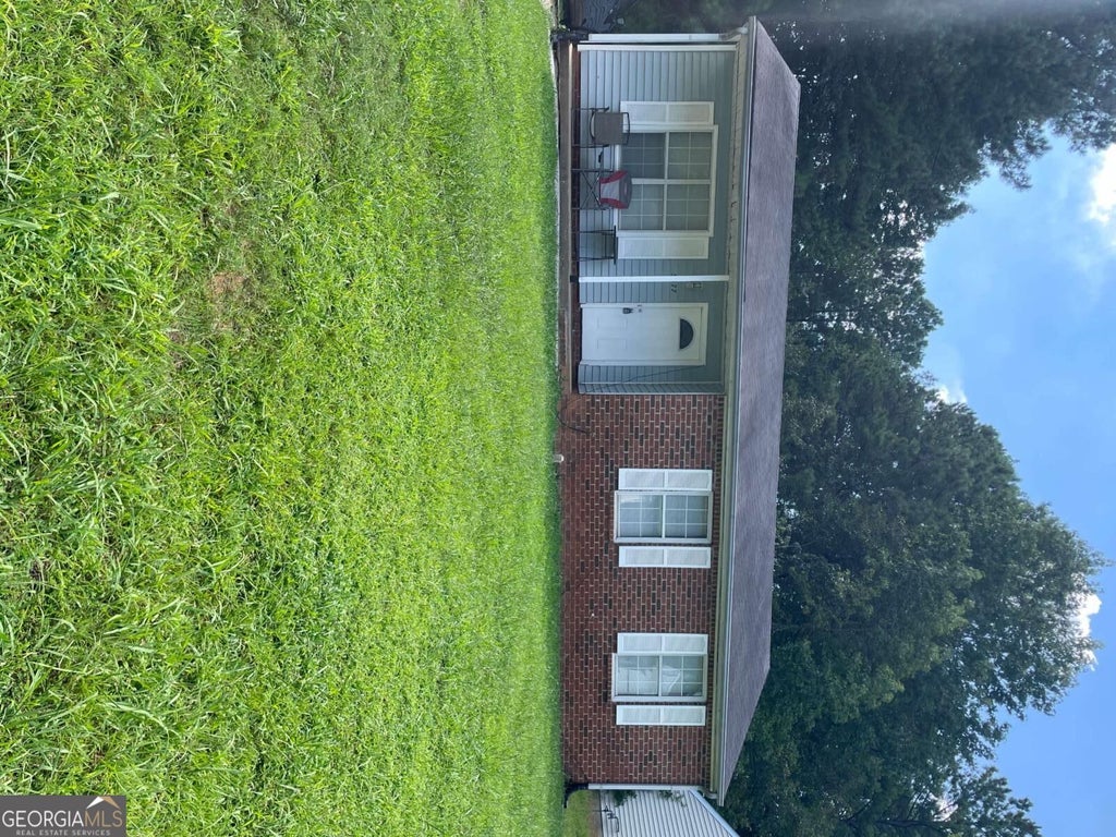 Photo of 5677 Pine Gate Drive, College Park, GA 30349 (MLS # 10873806)