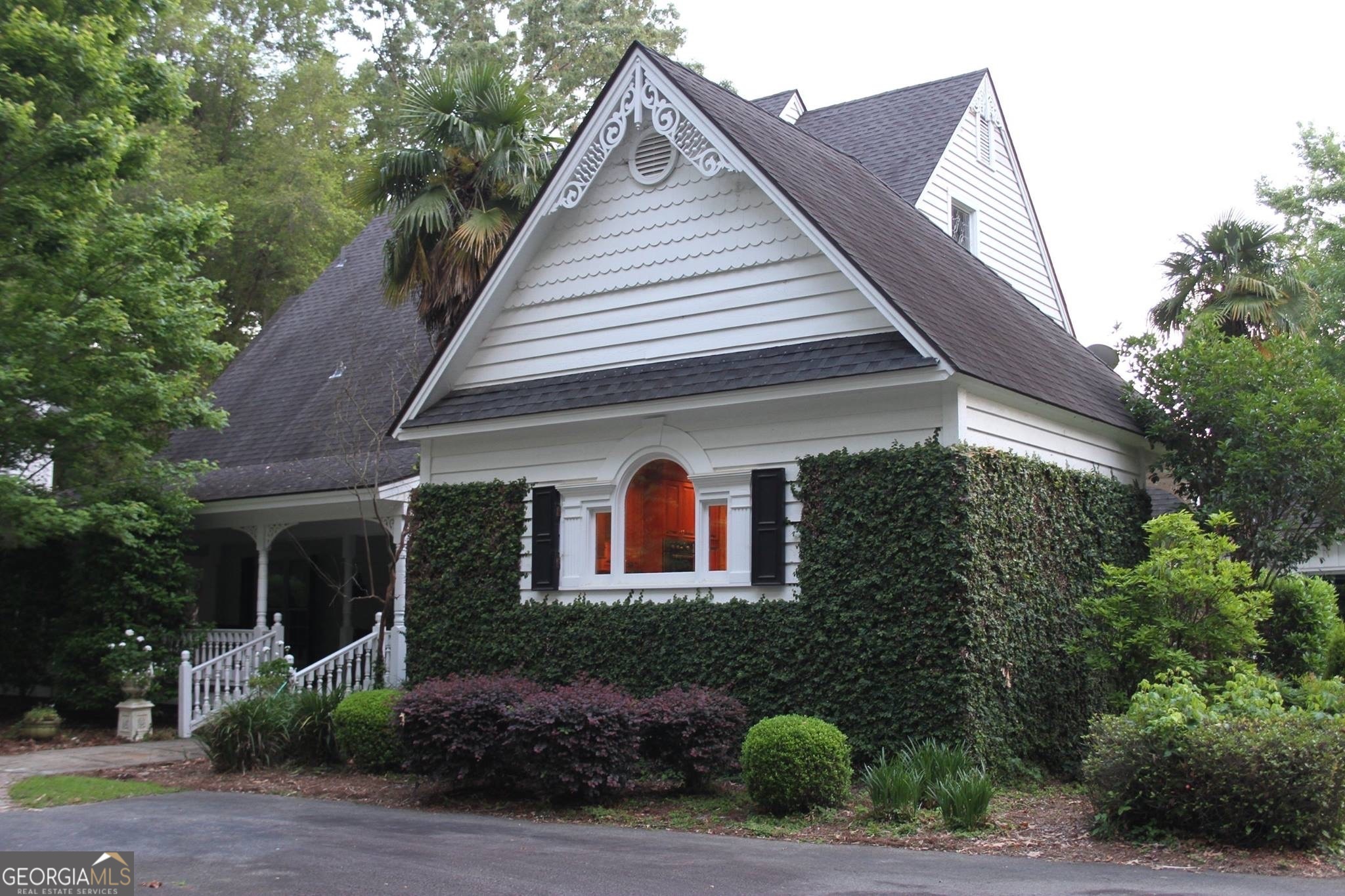 196 Ft Deep Water Frontage on Lake Blackshear. Home completely to studs and rebuilt 4 years ago. Nestled in the serene location of Lake Blackshear, this luxurious property is a dream come true for those seeking unparalleled comfort and sophistication. Boasting two driveways and a 2-car carport complete with a pool bathroom and storage space, this home exudes elegance and functionality. As you approach the residence, a stunning large water fountain welcomes you in the front yard, setting the tone for the grandeur that lies within. The wrap-around porch offers a perfect spot for relaxation and entertainment, while the interior showcases original hardwood floors, tile kitchen, and tile bathrooms. The elegant dining room and living room features high ceilings and expansive windows that offer breathtaking views of the in-ground pool and the picturesque lake. The chef's dream kitchen is equipped with brand-new appliances, including a freezer, refrigerator, and a built-in icemaker, as well as two sinks and ample cabinet space. The bar area, perfect for hosting guests, boasts seating for seven, built-in cabinets, and a new icemaker. ADT security included to keep peace of mind. The lower level of the home comprises two guest bedrooms, each with its own bathroom, while the upper level houses the luxurious master bedroom with a balcony and a master bathroom that features French doors, a new soaking tub with mood lighting, a separate walk-in shower, and a designer-built walk-in closet. The third story offers an office area with attic storage. Outside, a private dock/seawall provide endless opportunities since this house is located on deep waterfront lots of the lake. Additionally, a storage building on the property is ideal for storing tools and equipment. Don't miss the chance to experience the epitome of luxury living at this remarkable Lake Blackshear estate. ***Seller is a licensed associate broker in the State of Georgia and licensed Real Estate Agent in the State of Florida***