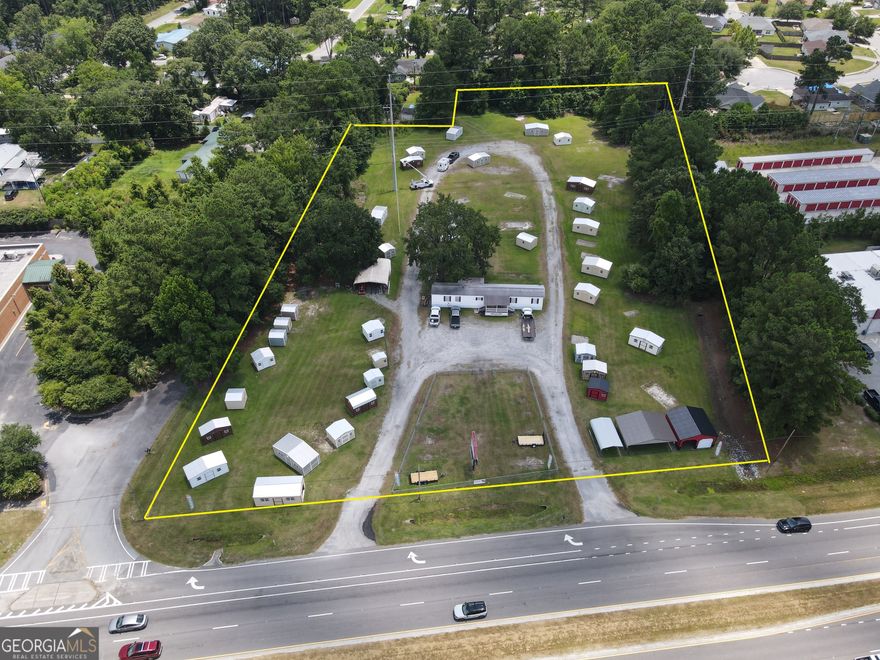 COMMERCIAL PROPERTY - OGEECHEE RD SAVANNAH GA - APPROX. 4 ACRES - MULTIPLE ENTRANCES/EXITS FROM TURNING LANE -