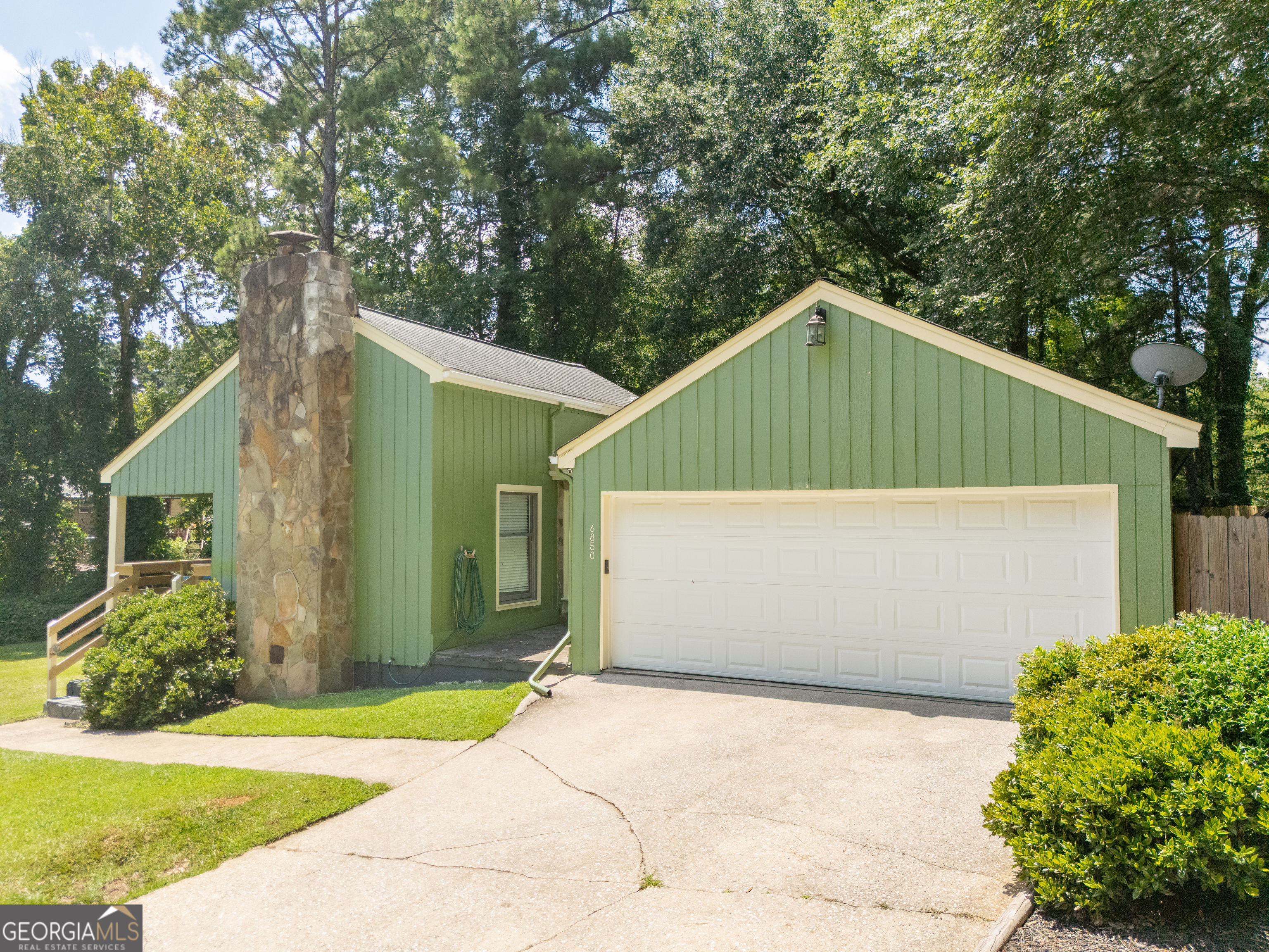 Set on a large lot in a quiet cul-de-sac, this 3-bed, 2-bath ranch offers 3 amazing options for buyers: 1). You could move right in, 2). Fix it up, or 3). Rent it out! This home features the flexibility modern buyers crave in an ideal location! Inside, enjoy 1,606 sq ft of open living space with luxury vinyl plank flooring, vaulted ceilings, and oversized windows. The stone fireplace adds warmth and character to the main living area. The large kitchen, home office, and spacious laundry room support easy living and work-from-home lifestyles. A two-car garage with built-in workbench is ideal for projects or storage. Enjoy nature views from the covered front porch or take advantage of the wide-open backyard. With its blend of function, comfort, and location-this home checks all the boxes!