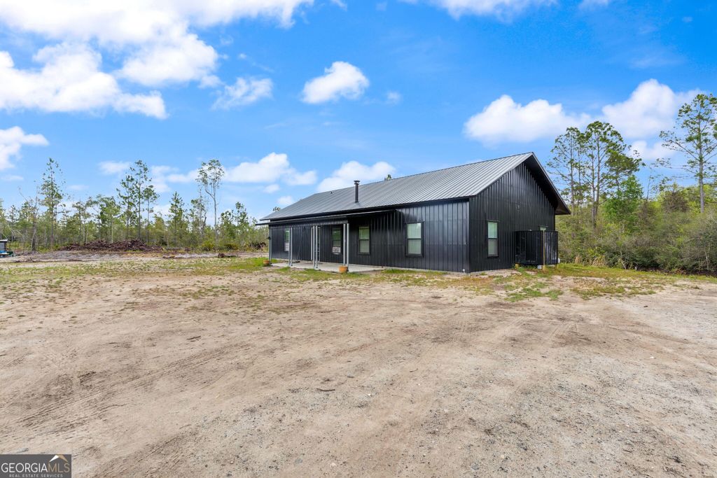 Photo of 882 Piketts Mill Trail, Waynesville, GA 31566 (MLS # 10769994)