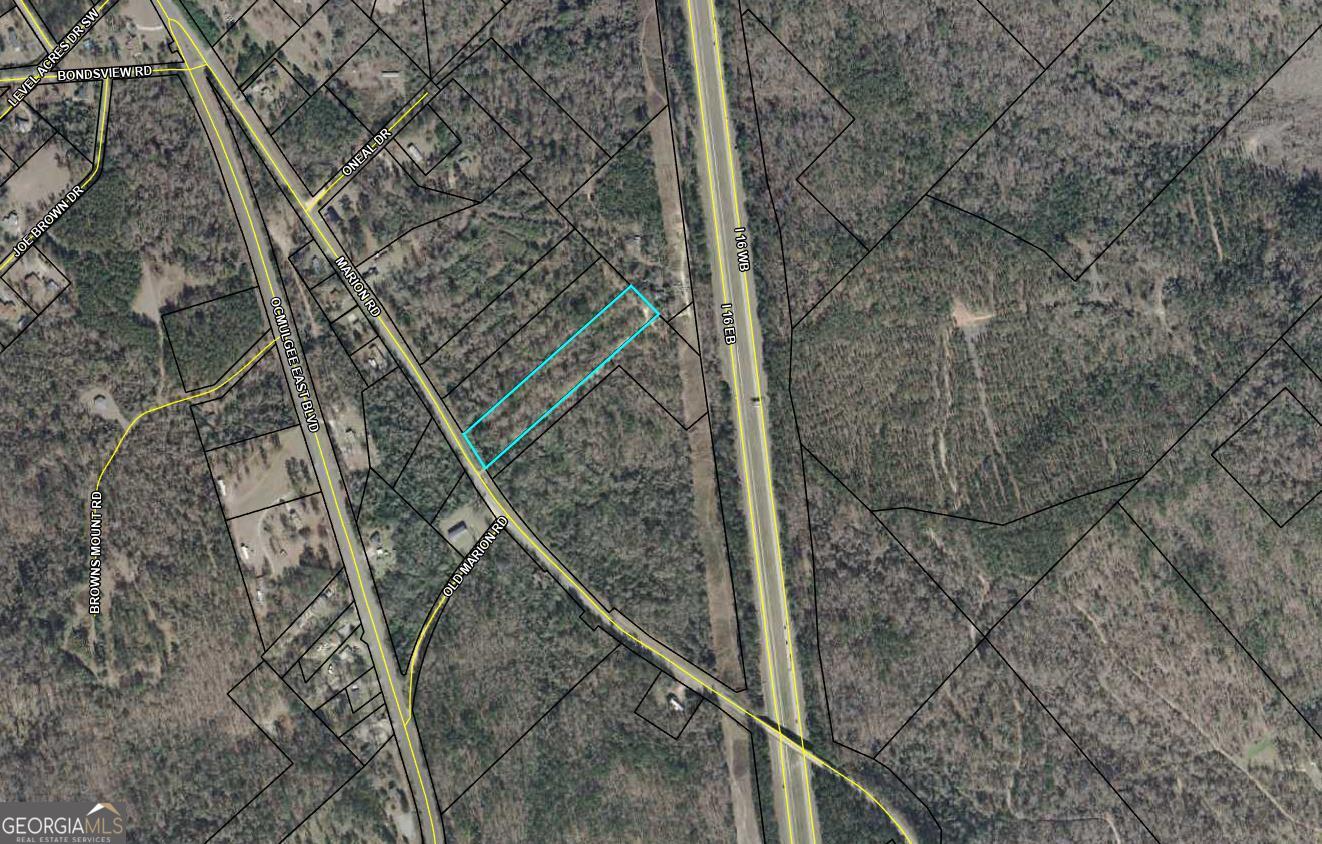 3.57 Acres - 5590 Marion Rd, Macon, GA Located in the quiet Marion Estates community, this 3.57-acre wooded lot offers privacy and room to build your dream home in a peaceful residential setting. City water is available through Macon-Bibb County Water & Sewer Authority, and an IV perc test has already been completed-showing the land is suitable for a septic system. All other utilities are available at the road. Just 2 miles from the GEICO Corporate campus and minutes from downtown Macon, this property combines space, convenience, and accessibility.