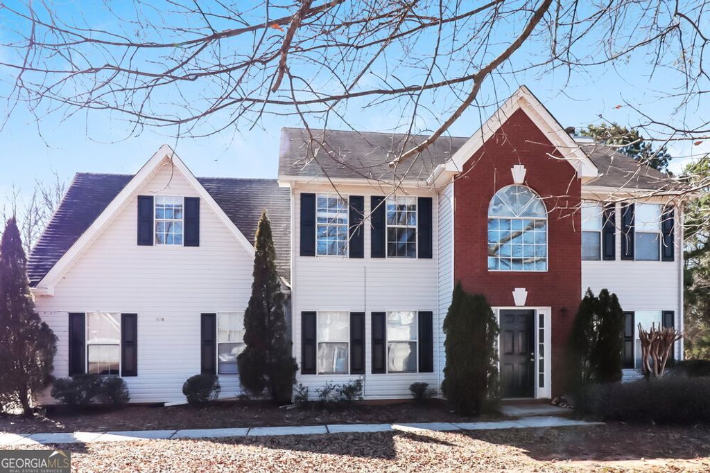 Photo of 409 Grove Park Drive, Locust Grove, GA 30248 (MLS # 10806203)