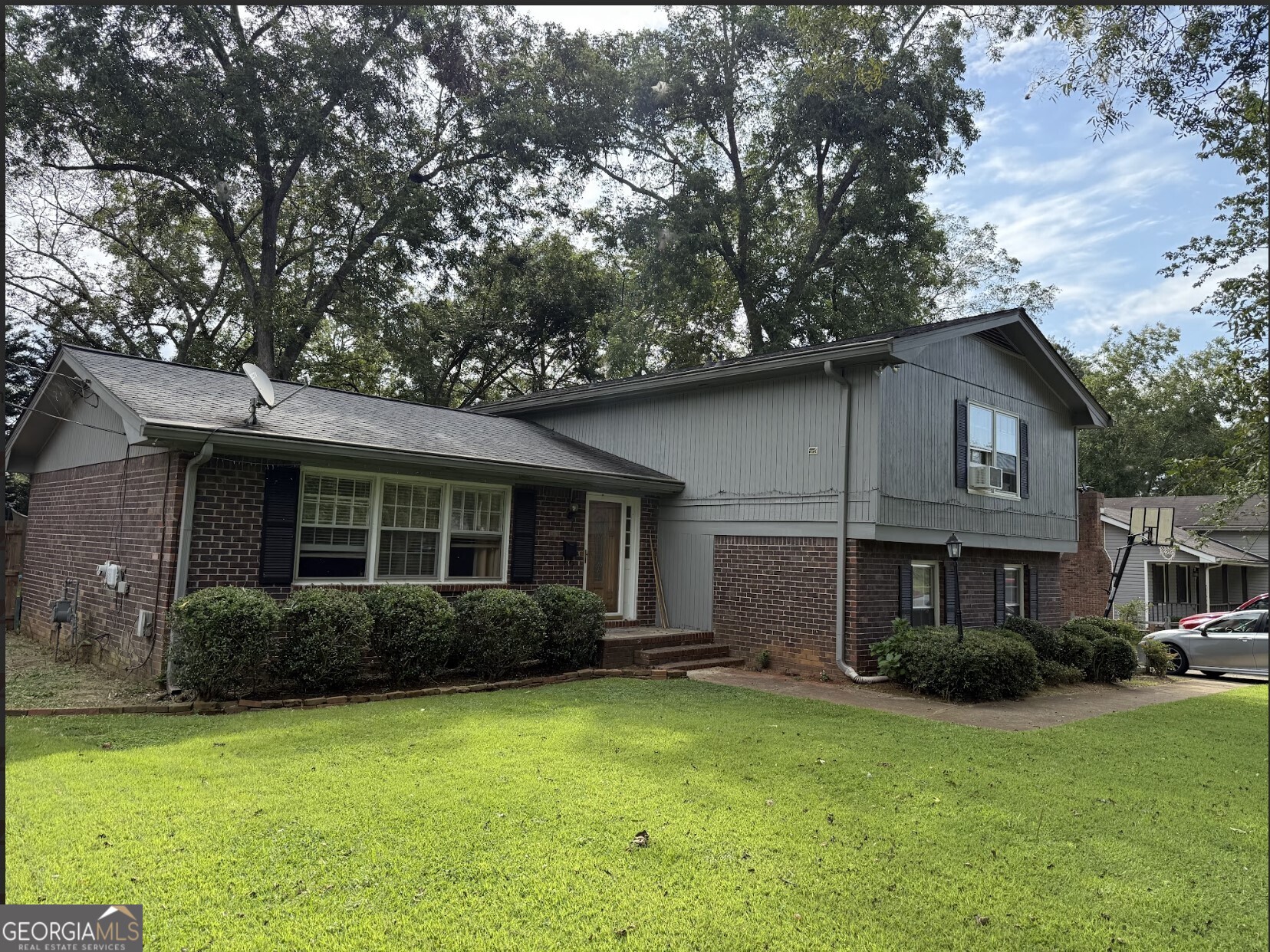 Welcome to 2910 Stanton Rd SE in Conyers-a well-maintained, move-in ready home that's perfect for first-time buyers, investors, or anyone looking to secure instant equity at wholesale pricing. This updated 4-bedroom, 2.5-bath home offers a spacious floor plan with a formal living room featuring picture windows, a separate dining room, and a cozy family room with a gas-start brick fireplace. The eat-in kitchen is well-appointed and ready for everyday meals or entertaining. Step outside to enjoy the newer sliding glass door leading to a covered back porch and a huge fenced backyard-perfect for gatherings, pets, or simply relaxing outdoors. Major systems are in great shape: Roof, gutters with guards, and HVAC - 6 years old Hot water heater - 5 years old Well-maintained and cared for over the years With solid systems, a functional layout, and unbeatable pricing, this home is a must-see for value-minded buyers who want to build equity from day one. Don't miss this chance to own a home priced well below market value in a great location-schedule your showing today!