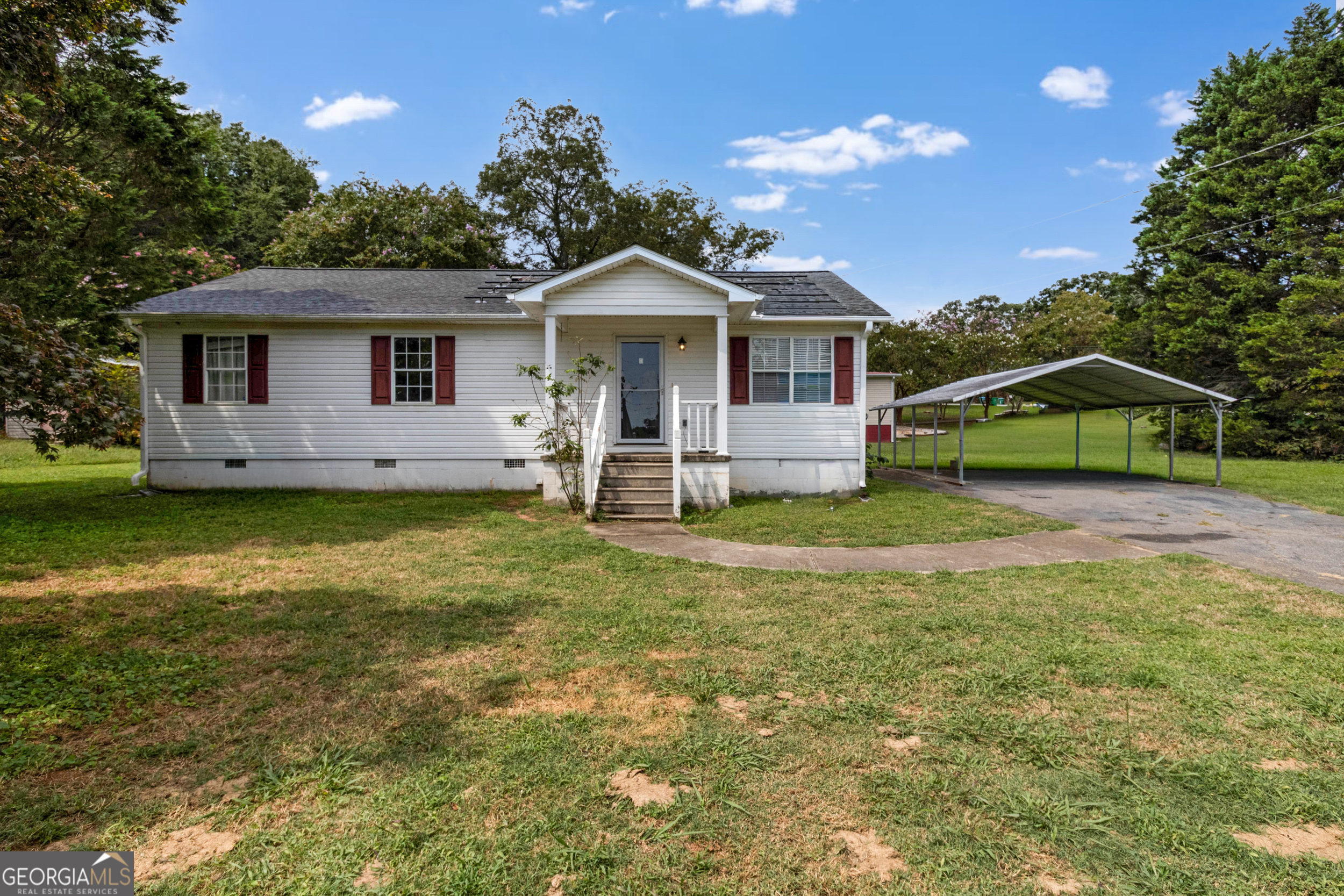 Welcome to this charming 3-bedroom, 2-bath ranch home on nearly half an acre in Banks County. Featuring an open layout with a bright family room, eat-in kitchen, and comfortable bedrooms all on the main level. Recent upgrades include a fully paid $55,000 solar panel system, providing significant monthly savings and long-term value. Outside, the level lot offers space for play, gardening, or relaxation. Conveniently located near Maysville and within the Banks County School District, this home combines comfort, efficiency, and sustainability