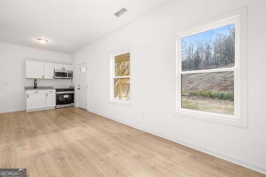 Photo of 4410 Ross Estates Court #3, Snellville, GA 30039 (MLS # 10694604)