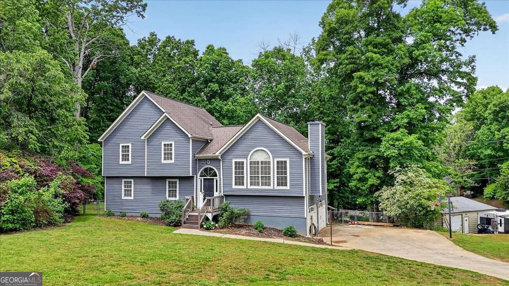 Photo of 980 Woodvalley Drive, Canton, GA 30115 (MLS # 10757686)