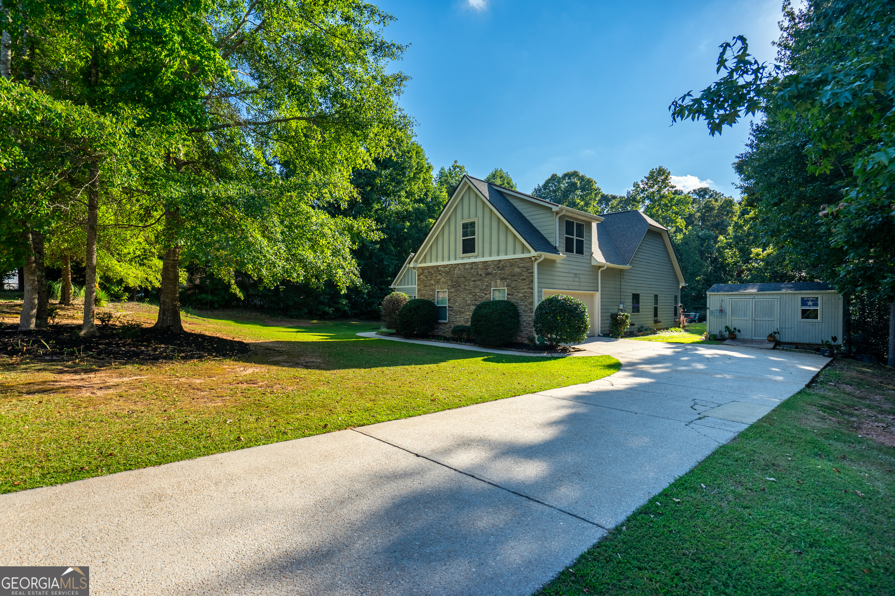 Discover your dream home in the desirable Cedar Ridge Community with this stunning four-bedroom, three-bathroom residence featuring 2,227 square feet of thoughtfully designed living space. This well-maintained property showcases an award-winning floor plan that seamlessly blends comfort with style, making it perfect for families who love to entertain. Step inside to find gleaming hardwood floors throughout an open and airy design enhanced by varied ceiling heights that create visual interest in every room. Natural light floods the interior, highlighting the home's spacious layout and quality construction. The primary suite offers a true retreat with generous proportions and a luxurious en-suite bathroom designed for relaxation after long days. The real showstopper awaits outdoors, where a private backyard oasis features an in-ground pool surrounded by beautifully maintained landscaping. This outdoor space transforms into the perfect venue for family gatherings, summer barbecues, and creating lasting memories with loved ones. Location advantages include proximity to vibrant downtown Hogansville, where local dining and shopping await exploration. Families will appreciate being near quality educational options like Callaway High School, while recreation enthusiasts can enjoy nearby Hogansville Sportsplex for active pursuits and community events. The Cedar Ridge Community offers a peaceful residential setting while maintaining convenient access to amenities and attractions. Quality construction details and thoughtful maintenance throughout demonstrate pride of ownership, ensuring new residents can move in and immediately begin enjoying their new lifestyle. This exceptional property combines indoor comfort with outdoor entertainment possibilities, creating an ideal setting for families ready to embrace gracious living in LaGrange.