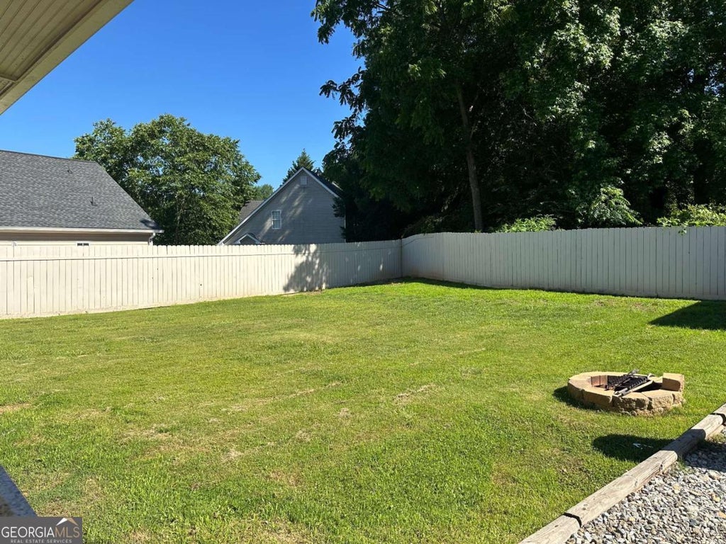 Photo of 703 Jay Street, Canton, GA 30115 (MLS # 10786416)