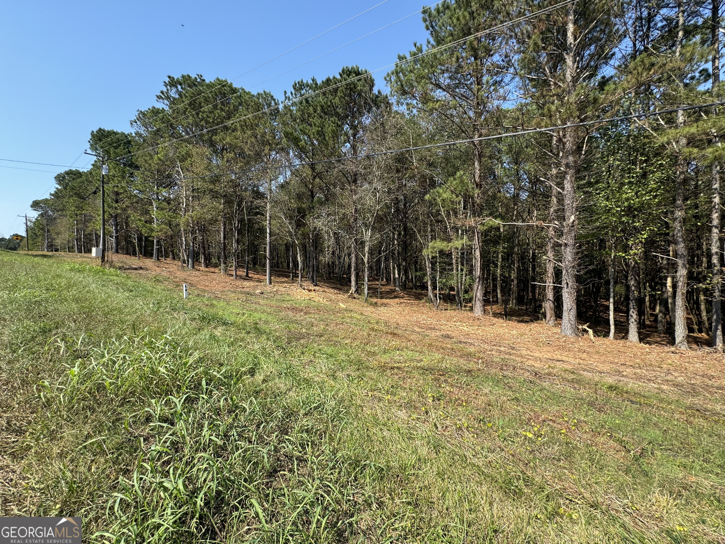 5+ Acres - Small Agriculture Zoning - Creek Frontage - Permit-Ready Build Site Rare opportunity! Over 5 acres of beautifully mulched and prepped land, bordered by a creek on two sides. This property is county-approved and permit-ready, with completed soil work and an ideal homesite already in place. Zoned for Small Agriculture - Perfect for hobby farming, gardening, or country living County water available - Easy access to utilities Mobile home restrictions in place - Ensures a quality neighborhood feel Private, peaceful setting - Hard-to-find lot with natural beauty and ready-to-build potential Whether you're ready to build your dream home or looking for a serene agricultural property, this is a one-of-a-kind opportunity you don't want to miss!