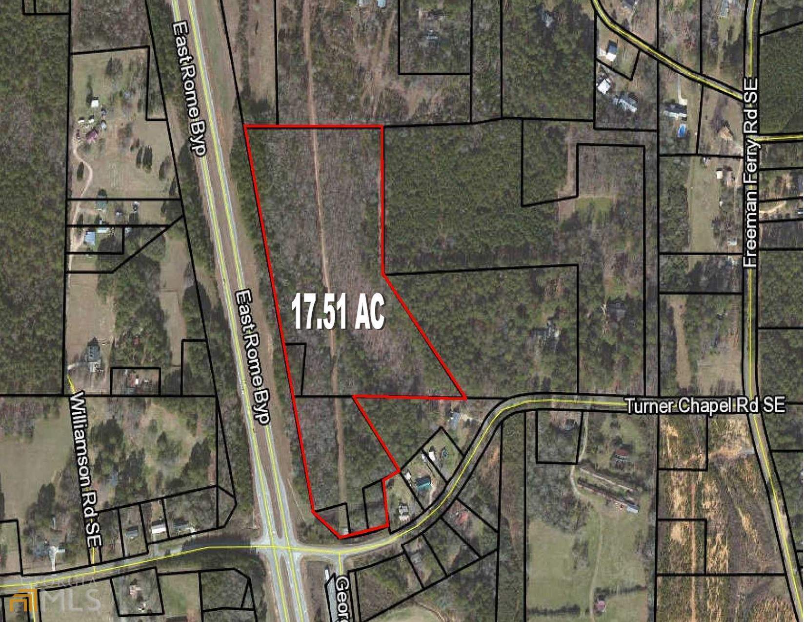 17.51 Acre tract of land located on the corner on Veterans Memorial Hwy and Turner Chapel Rd. With approximately 1500 feet of road visibility on Veterans Memorial Hwy and access from Turner Chapel Rd, this tract has potential for commercial, Industrial or residential development. Commercial or Industrial uses would require rezoning. Located approximately 2.00 miles from Hwy 411 which connects Rome to Cartersville. Tax parcels K14W-021, K14W-022, K14W-023, K14Z-117, and K14Z-118 are included for a total of 17.51 per Floyd County tax records. On tax parcel K14W-023, only the east side of the Veterans Memorial Hwy is included. (See aerial photos).Owners do not have a survey. Excellent location for warehousing. Also corner has potential for convenience/gas store. Owner is open to offers with zoning contingencies. Buyer to verify zoning and utilities.