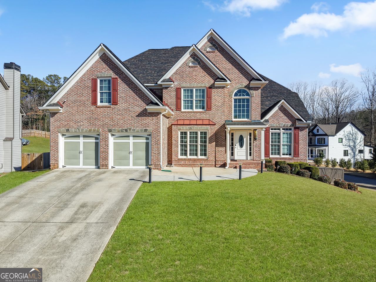 Your Dream Home Awaits in Royal Oak Estates - No HOA & Priced to Sell! Welcome to this stunning 6-bedroom, 4-bathroom retreat filled with natural light, space, and style. Located in the highly desirable Royal Oak Estates neighborhood-with no HOA-this home offers the perfect mix of elegance, comfort, and functionality. Step through a grand two-story foyer into inviting formal living and dining spaces, ideal for entertaining. Gleaming hardwood floors flow throughout the main level, leading to a kitchen featuring granite countertops, double ovens, stainless steel appliances, a spacious pantry, and a charming coffee nook. The open-concept living room extends seamlessly to a screened-in porch that overlooks a flat, private backyard-perfect for gatherings, relaxation, or even a future pool! A main-level bedroom with a full bath offers an ideal setup for guests or multigenerational living. Upstairs, enjoy your private escape in the oversized primary suite, complete with tray ceilings, a spa-like ensuite with dual vanities, a soaking tub, separate shower, and his & hers walk-in closets. Three additional bedrooms with walk-in closets share a well-appointed full bath with dual sinks. The fully finished basement is an entertainer's dream-featuring a home theater, a full in-law suite with kitchen and bath, and a versatile flex room with a large closet. Endless options for work, play, or additional guest space! Freshly painted and move-in ready, this home also includes a covered back deck, 2-car garage, good schools and easy access to interstates, shopping, and dining. Don't miss your chance to own this extraordinary home-schedule your private showing today! Special financing and incentives available if working with seller's preferred lender.