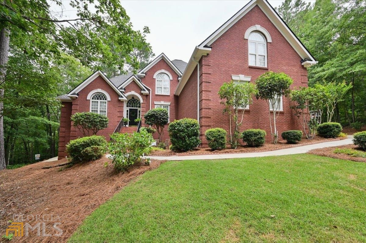 Incredible location and setting!!! Beautiful all brick 6 bedroom 5 bath home sits on 3.85 acres in private, quiet, wonderful north Macon location. Home features master bedroom and guest bedroom on main level. Beautiful living spaces with the most incredible screened in porch. Walk-out basement with game room, family room, bar area, bedroom, bath, office and large storage room.