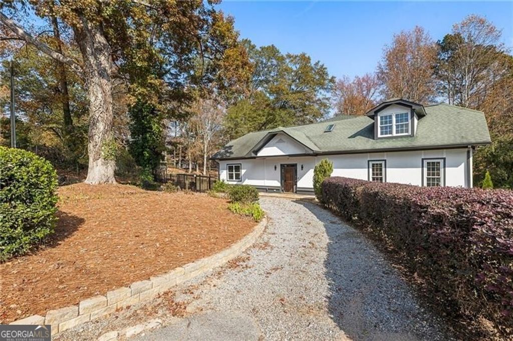 Photo of 14440 Cogburn Road, Alpharetta, GA 30004 (MLS # 10765878)
