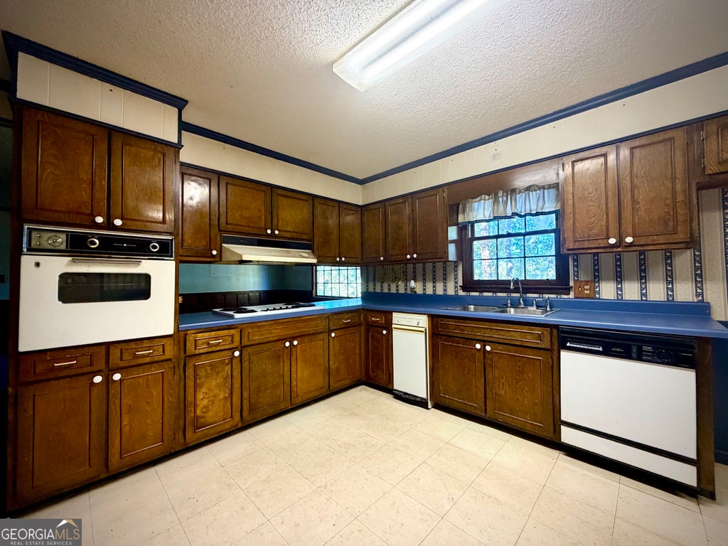 Photo of 511 Brookdale Drive, Dublin, GA 31021 (MLS # 10874940)