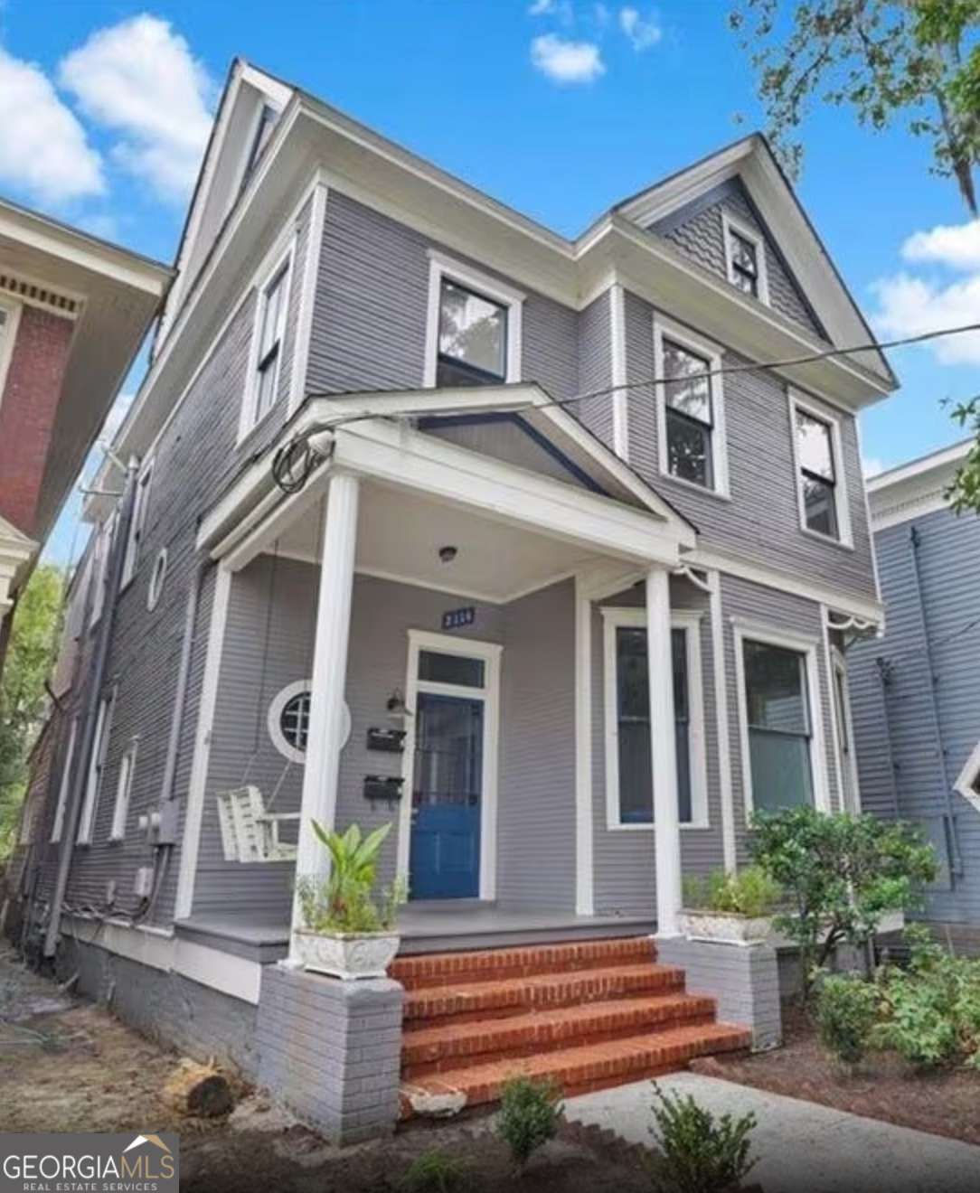 This is an exceptional investment opportunity featuring a spacious two-unit residence. The lower unit offers a charming 2-bedroom, 1-bath layout with two fireplaces, a bay window, and elegant pocket doors. It includes a full kitchen, dining area, and a laundry room equipped with a washer and dryer. The upper unit comprises 3 bedrooms and 1 bathroom, with one bedroom suitable for conversion into a secure office space. It also features a kitchen, dining area, and its own laundry room with washer and dryer. Both units provide generous living space and functional layouts, ideal for multi-family living or rental income. All this, just minutes away from the distinctive culture and ambiance of historic downtown Savannah.