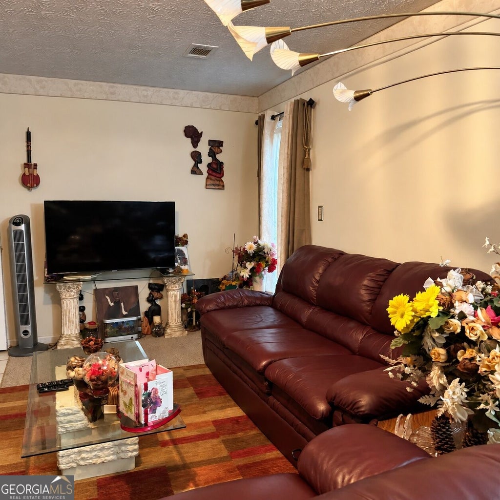 Photo of 7571 Kevin Pl, Jonesboro, GA 30236 (MLS # 10868465)
