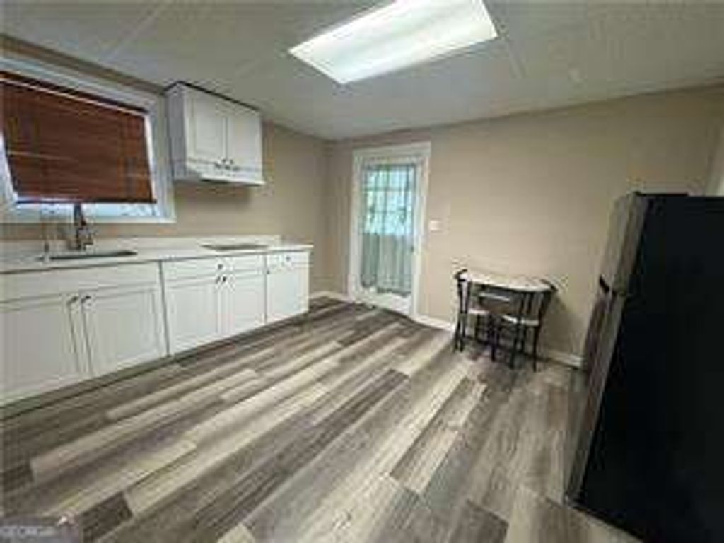 Photo of 5971 Robin Hood Lane, Norcross, GA 30093 (MLS # 10757736)
