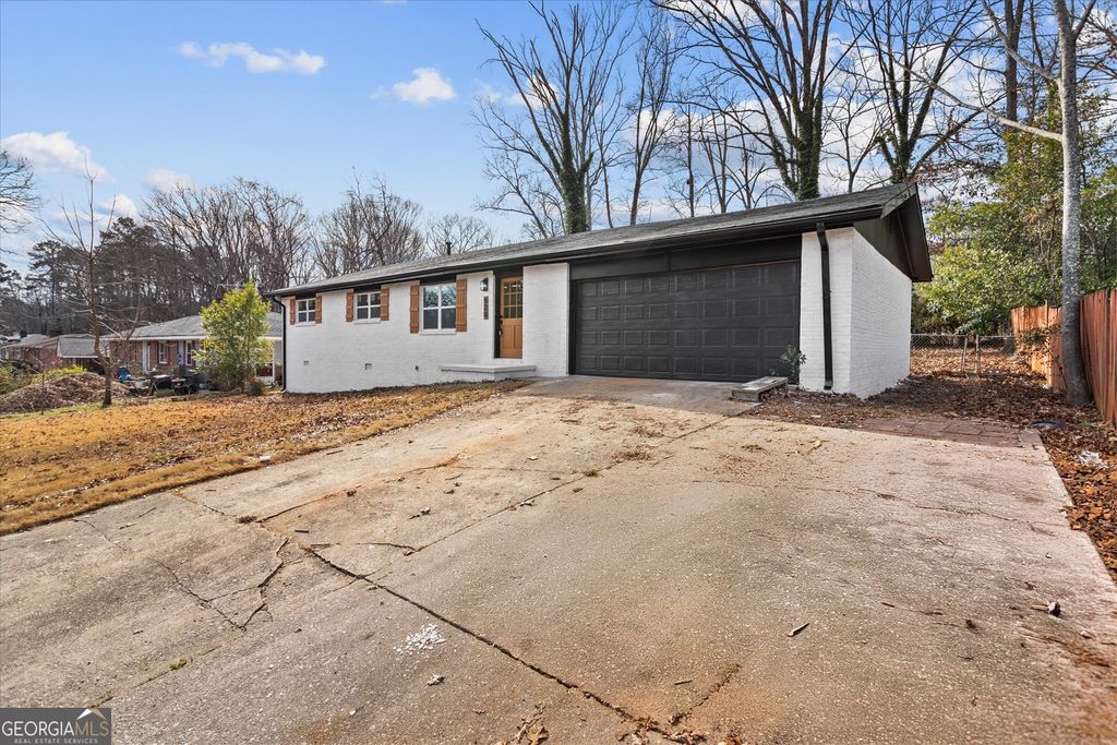 Photo of 520 Stonewood Drive, Stone Mountain, GA 30087 (MLS # 10678683)