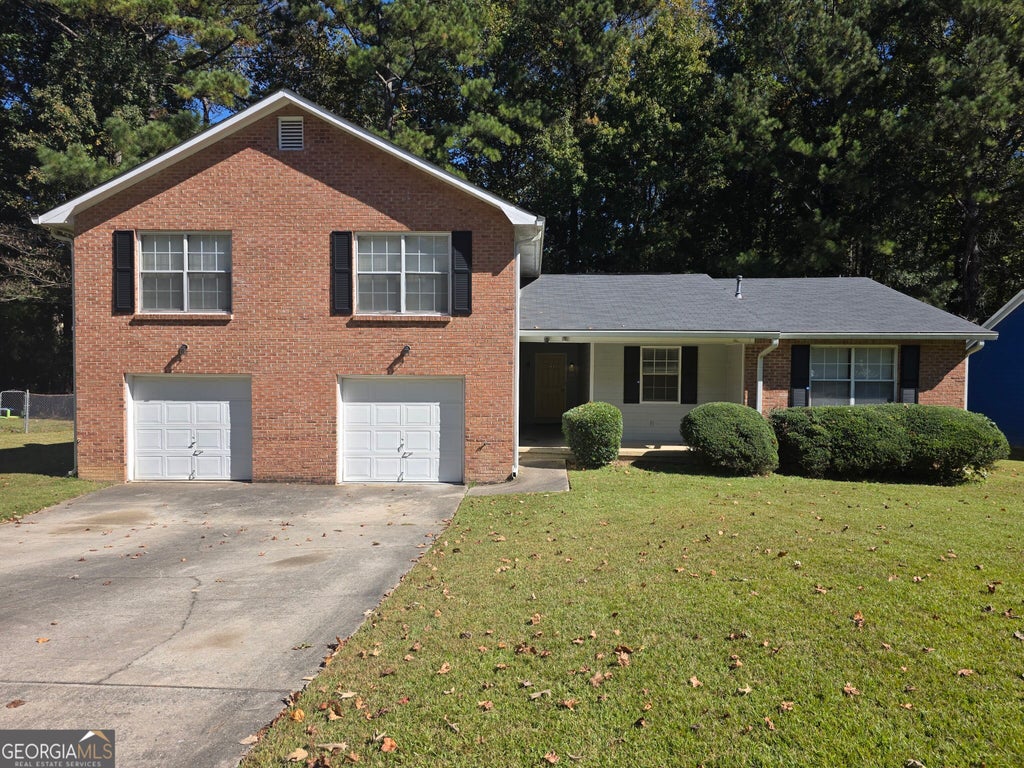 Photo of 5852 Summerglen Lane, Atlanta, GA 30349 (MLS # 10876825)