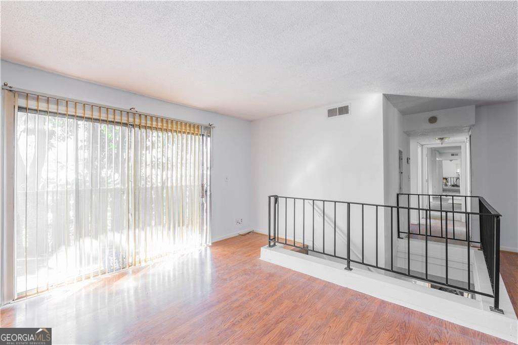 Rare opportunity to own one of the largest units in the community - over 2,000 sq ft of living space featuring 4 bedrooms, 3 full bathrooms, oversized living and dining areas, and a private balcony. Ideal for multi-generational living, first-time buyers needing space, or investors seeking strong rental potential. All-electric systems, large closets, and low-maintenance finishes throughout. Recent updates include new HVAC (2022) and newer water heater. Conveniently located near Hartsfield-Jackson Airport, I-85, I-285, Camp Creek Marketplace, and public transit. Seller is offering to cover up to 12 months of HOA dues with an acceptable offer - a rare incentive and immediate savings for the buyer. Note: The community is in need of cosmetic and maintenance improvements, including grounds upkeep and road repairs. This is reflected in the price and seller incentive, offering buyers a great opportunity to build equity as the area improves. Priced to sell. Vacant and easy to show.