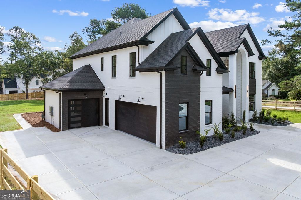 Photo of 876 Bramlett Shoals Road, Lawrenceville, GA 30045 (MLS # 10683757)