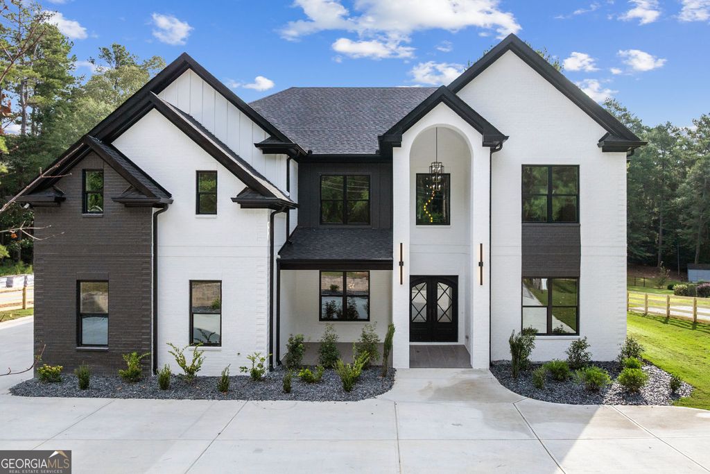 Photo of 876 Bramlett Shoals Road, Lawrenceville, GA 30045 (MLS # 10683757)