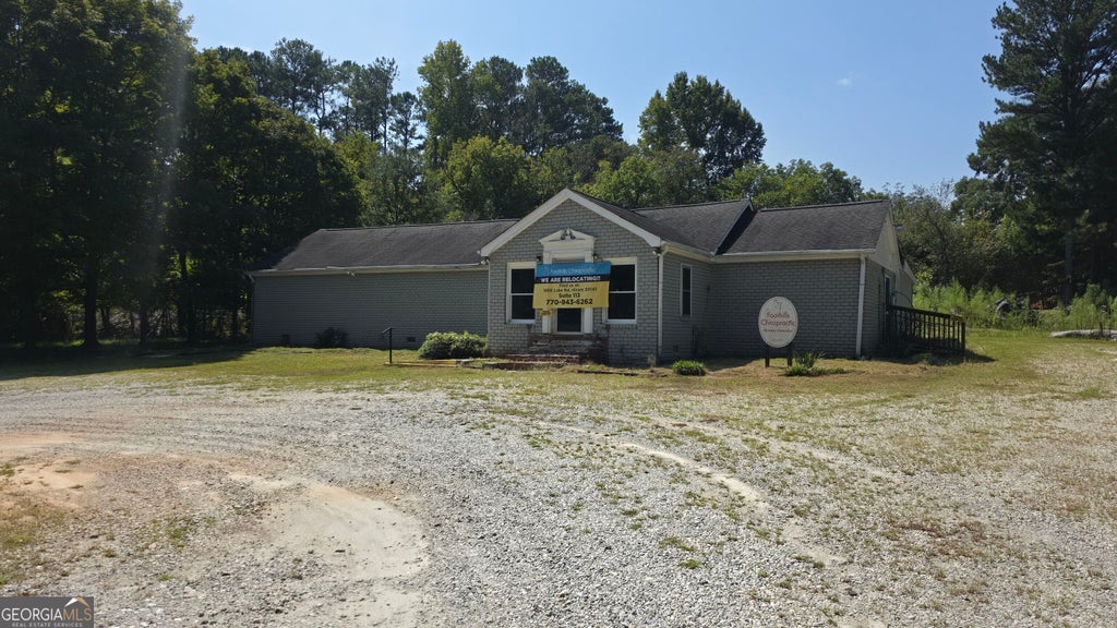Photo of 5447 Powder Springs Dallas Road SW, Powder Springs, GA 30127 (MLS # 10848461)