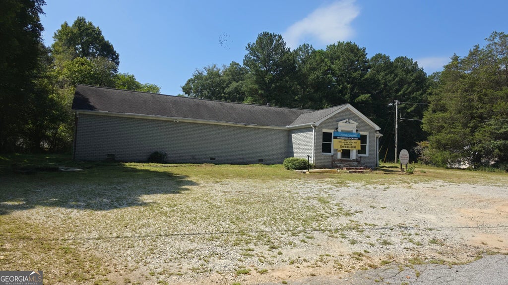 Photo of 5447 Powder Springs Dallas Road SW, Powder Springs, GA 30127 (MLS # 10848461)