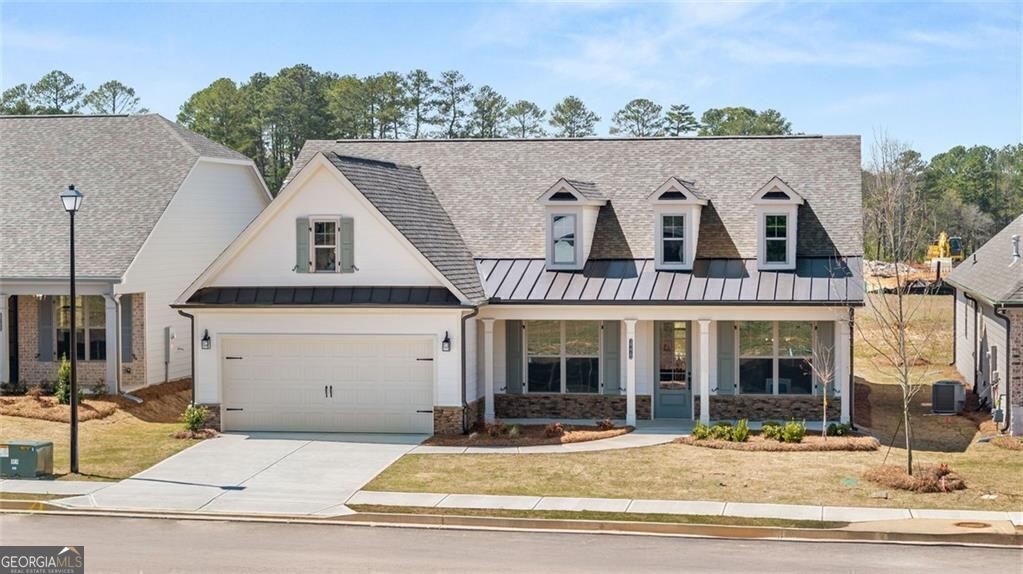Welcome to Soleil Summit Chase! A Gated Luxury Resort Style 55+ Active Adult community by award Winning Builder Patrick Malloy Communities. Located in Snellville, Ga, Soleil Summit Chase will offer a vacation setting one can only dream about in the Gwinnett area! Upon entering, our approximate 5,000 sq ft Clubhouse your Great room with Bar will greet you and your guests, enjoy the Card/Game room and Flex Room! For events there is a Catering Kitchen! For the outdoor and fitness enthusiast utilize the Fitness room, yoga patio and swimming pool with sun shelf! For those who love the outdoors, we didn't forget about you! Other unmatched amenities include a Grilling and Fire Pit area, a community Garden, Event Lawn, a Dog Park, and Pickleball Courts. And enjoy the many future events planned by the community's very own Resort Director! Our Jefferson plan is another favorite for Soleil homeowners, this 2100+ sq.ft. home has abundant living space! A large covered front porch to your entry foyer that is flanked by a Formal Dining room and Study/Flex room. Moving into your open concept living area is your Family room, Kitchen with huge island with breakfast bar and separate eating area, walk-in pantry and stacked cabinetry with 11' Ceilings! Walk out from family room to welcoming covered rear patio! The primary bedroom offers a bay window sitting area, ensuite with zero entry shower with bench and huge closet! The secondary bedroom with walk-in closet and laundry room with upgraded sink with cabinet. HOA includes yard maintenance, Internet, and securing monitoring system. Don't miss out on the savings offered now on Quick Move-In homes!! Soleil Summit Chase isn't just a community of Ranch style homes; it is truly a New Lifestyle where it's all about You!!