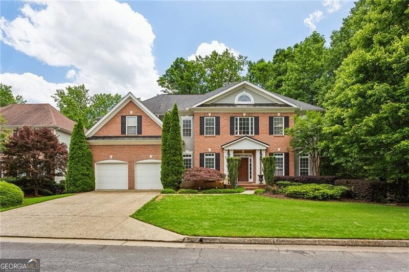Amazing leasing opportunity in sought after East Cobb location! Nestled in award winning Walton school district, this gorgeous updated brick home offers a perfect blend of elegance and comfort. Featuring an open floor plan and hardwood floors throughout the main level, this residence is designed to impress. A two-story great room opens to the kitchen, creating a seamless flow for entertaining and daily living. Walk out to the spacious deck with a serene wooded view, perfect for entertaining or just enjoying the outdoors. Relax in your spacious master suite complete with trey ceilings and spacious walk-in custom closet. Iron staircase railings and modern light fixtures add a touch of sophistication throughout the home. A versatile daylight basement includes a playroom, TV room, and two large storage spaces, offering ample room for recreation and organization. The professionally landscaped yard features a large play area, ideal for outdoor activities and family gatherings. Walk to the neighborhood swim/tennis facilities and playground, providing endless fun and fitness options. Conveniently located just 5 minutes from I-75 and endless shopping and dining opportunities, this home offers both tranquility and accessibility. Don't miss out on this beauty-it won't last long!