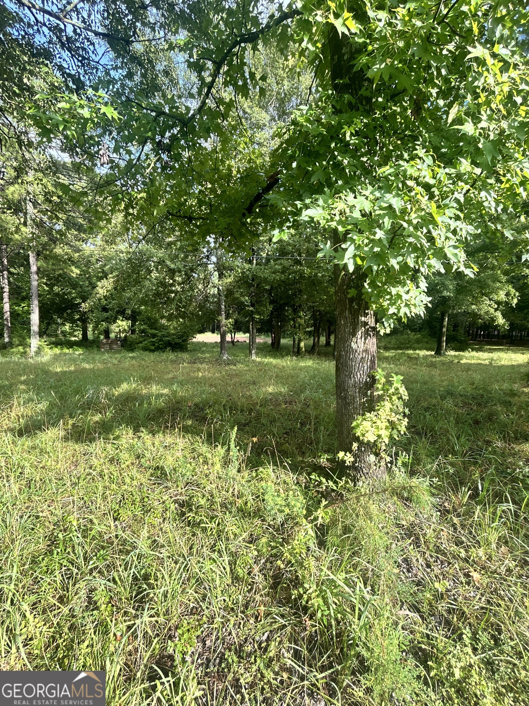 This 6.37-acre wooded parcel at 1040 Perryman Rd presents a rare opportunity for your dream build project. Natural setting with privacy and minimal restrictions, no HOA. Working well, already in place. Prec - test is scheduled to be done. Grading has started on where the house was going to be built.