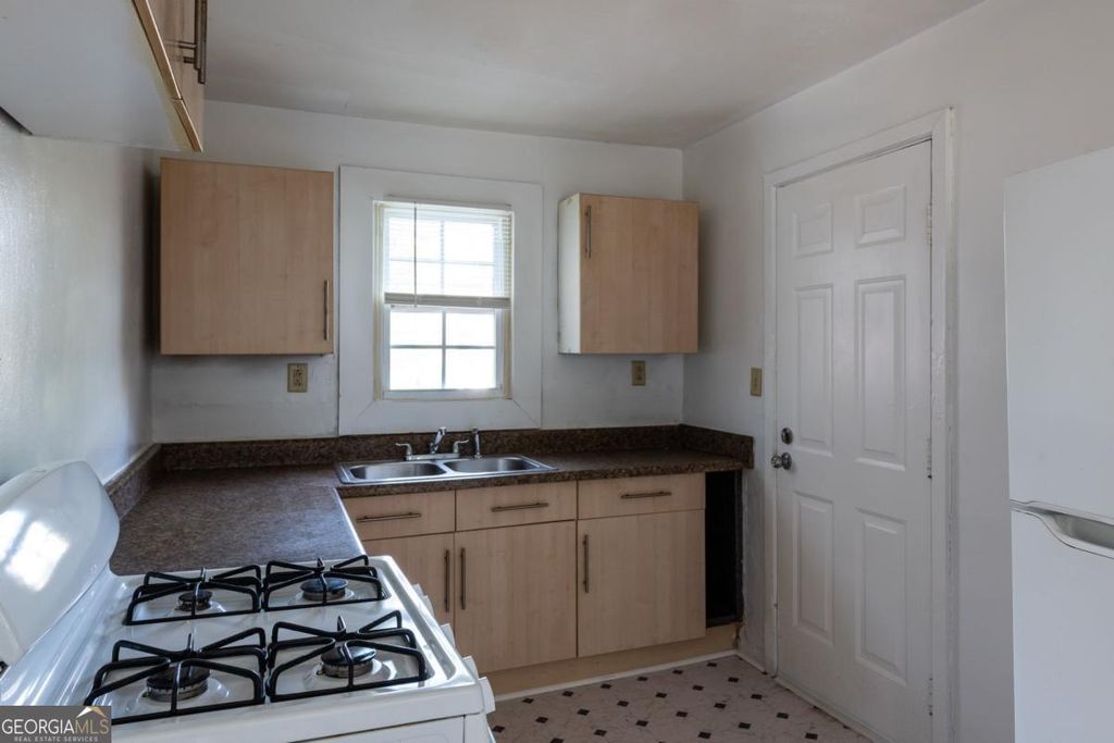 Photo of 1801 Oakmont Drive NW, Atlanta, GA 30314 (MLS # 10671174)