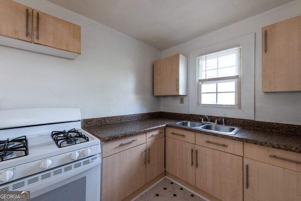 Photo of 1801 Oakmont Drive NW, Atlanta, GA 30314 (MLS # 10671174)