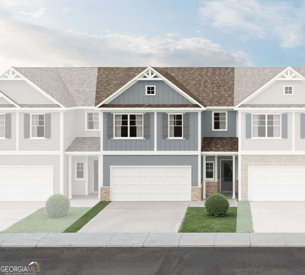 Welcome to this beautifully designed 1,946 sqft townhome located in the vibrant and highly sought-after community of Woodstock, GA. Boasting 3 spacious bedrooms and 2.5 modern baths, this home offers the perfect blend of comfort, style, and convenience. Step inside to discover soaring 9-foot ceilings and durable luxury vinyl plank (LVP) flooring throughout the main living areas. Enjoy a bright, open-concept layout enhanced by energy-efficient LED downlights that create a warm and inviting ambiance. The chef-inspired kitchen features sleek granite countertops, ample cabinetry, and a large island perfect for entertaining or casual dining. The elegant owner's suite includes a luxurious double vanity and plenty of space to unwind after a long day. Additional highlights include an open rail staircase that adds architectural charm and a sense of flow to the space. Located just minutes from downtown Woodstock, top-rated schools, shopping, dining, and parks - this home has it all! Don't miss your chance to own this turnkey townhome in one of metro Atlanta's most desirable suburbs. Schedule your private tour today!
