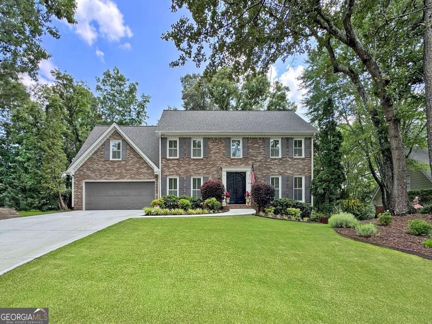 A great place to call home! You will love this beautiful 4 Bed, 2.5 Bath 4-sided brick beauty located on a quiet cul-de-sac street in the Roswell Swim/Tennis community of Studdiford! This home has been meticulously maintained by its owners of 30 years! The main living level includes a formal living room, formal dining room, fireside family room with custom built-ins and convenient pass-through wet bar, fabulous cozy all-season room overlooking the tree canopy of the backyard, and finally, the beautiful kitchen with rich wood cabinetry, granite countertops, double oven, stainless appliances, desk area, and adjacent breakfast area looking out to the large deck and backyard. Upstairs, you'll find three spacious guest bedrooms, a bonus room, a guest bathroom, and the oversized primary bedroom with tray ceiling, large walk-in closet, and spa-like, newly renovated ensuite bath with double vanity, walk-in shower, and separate soaking tub. The walk-out, daylight terrace level includes a large multi-purpose space, perfect for media, game or hobby area, and plenty of unfinished storage space! Outside, you can enjoy entertaining on the deck that overlooks the fenced-in, tree-lined backyard! New windows, new driveway, new water heater! Studdiford offers residents access to a large pool, playground, tennis courts, and lots of community activities! Enjoy the convenience of being a short distance from three shopping centers, including Kroger, Publix, and Fresh Market! Don't miss out on the opportunity to own a home in this fantastic community!