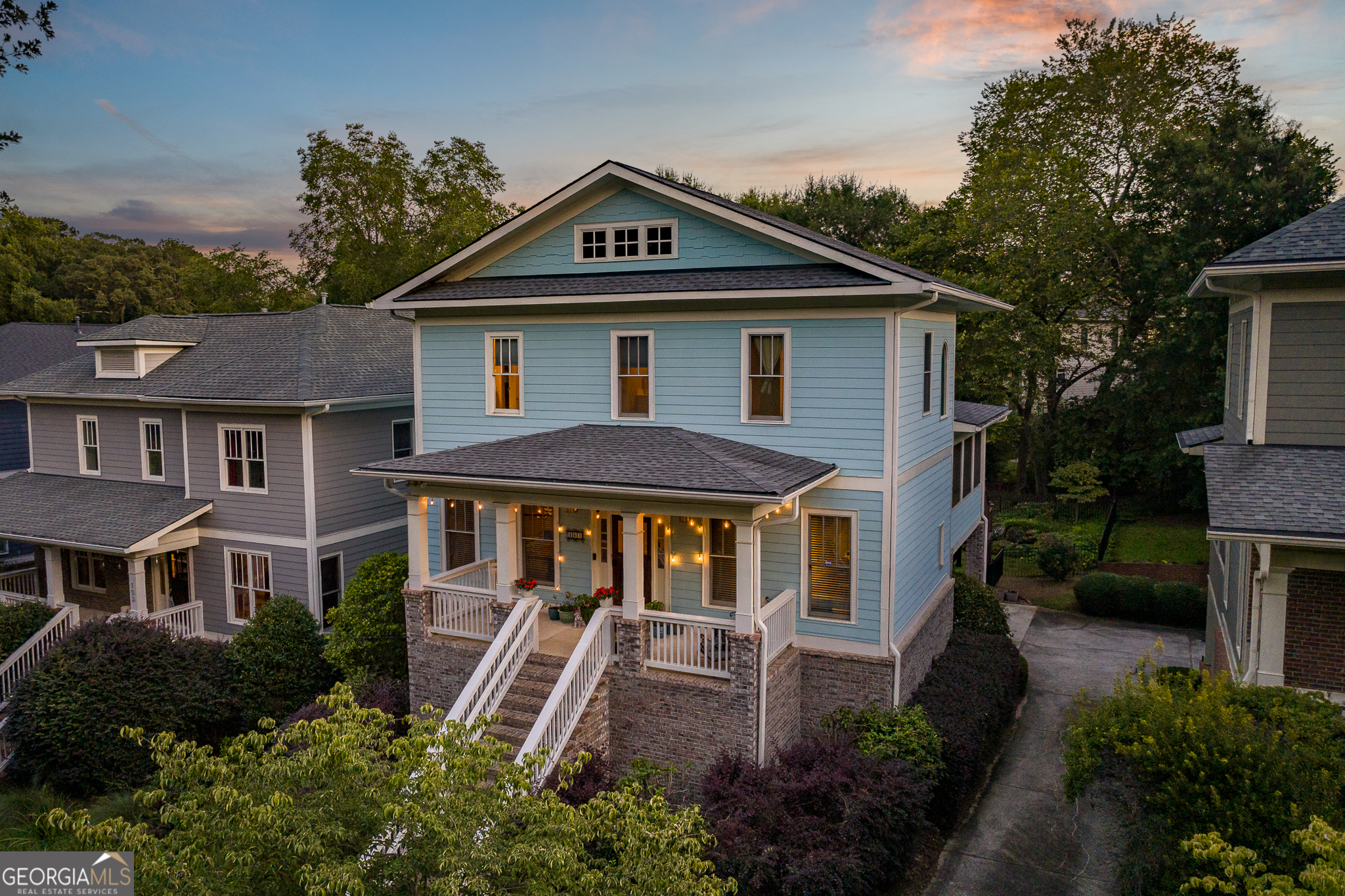 Most houses hum one tune.This one? A whole playlist of moods. 163 Easy Street sits a block from Boulevard in Parkside at Normaltown, a 15-home enclave where neighbors wave but don't pry, and morning coffee tastes better because Sips is just around the corner. Built in 2004 by John Willis Homes, it's solid in its bones but sly in its details, always just a little more thoughtful than expected. On the main floor, it plays gracious host: formal dining ready for holiday roasts or poker nights, an office/library that reads business in the morning, but welcomes a science fair project, or an unfinished novel, by afternoon. The kitchen hums with purpose: a commercial ice machine that feels like an overindulgence until you can't live without it; a butler's pantry tucks gadgets away for later; windows framing green instead of neighbors. The living room keeps the spotlight balanced, built-ins and a Heatilator fireplace at center, tall picture windows throwing in the kind of natural light that makes everything sparkle. By the time you wander onto the screened porch or Trex deck, the house has already shifted to its softer mood: linger, stay, watch a sunset not the clock. Upstairs, the primary suite prefers a little drama: vaulted ceilings, its own fireplace, treetop views that change wardrobe each season, and a mini-split for micro personalized comfort. Two more bedrooms keep things calmer, sharing a Jack-and-Jill with two separate vanities that stay politely out of the way. The terrace level has a different mindset: more calculating, less dreamy. A fully finished apartment with its own entrance, kitchen, laundry, bedroom, and steam shower. It's the side of the house that thinks in spreadsheets: rental income, multigenerational living, six-month stays that turn into twelve. A flex room (currently a gym) and lockable garage storage only add to the practicality. In Boulevard, where rentable space disappears in seconds, this is the rare side of a home that pays dividends. Recent updates-roof (2020), HVAC, water heater, mini-split-make the practical voice even louder. Outside, a fenced backyard leans green and quiet, the kind of stage any Sandy, curled up in the final act, would happily call her own. Parkside's shared greenspace adds just a little more breathing room. Morning mood? Coffee at Sips. Afternoon? A beer at Hi-Lo. Evening? Rooftop dining in Normaltown. And just beyond the calm, Cobbham and downtown open up-music, patios, and the pulse of Athens at full tilt. 163 Easy Street doesn't just speak. It plays different scenes, some lit in lamplight with books and bourbon, others wide open with morning windows and laughter; shifting, adapting to your needs. And whichever side you meet first, it'll feel like the right one.