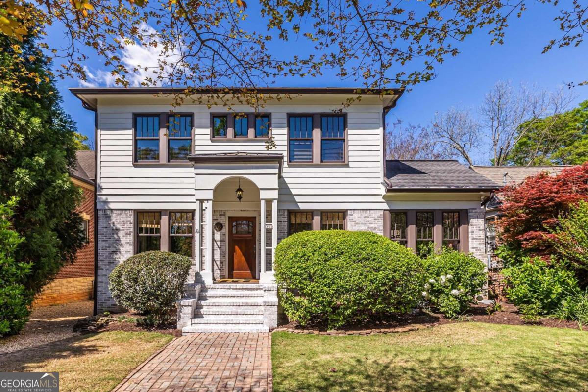 Originally built in 1925, this meticulously maintained and thoughtfully expanded bungalow is the epitome of Decatur living. Step into the original part of the home, the living room with its original fireplace, tiled sunroom, and dining room. Beyond the dining room beats the heart of the home: the chef's kitchen with freshly-painted custom cabinetry and AGA appliances. Entertaining is seamless as you continue through the light-filled family room with fireplace and out onto the wide screened porch. Overlooking an easy-care saltwater pool and manicured landscape below, the screened porch has room for dining and relaxing. Upstairs find the primary suite, two secondary bedrooms, laundry, bonus area for another office or homework station, and a sprawling Ipe wood deck overlooking the back yard. Retreat to your spacious and sunny primary suite including an office/sitting room. The spa-like primary bathroom and walk-in closet complete this oasis. With inspections performed, repairs made, and fresh paint throughout, this home has been lovingly prepared for its next owner. Walkable to shops and restaurants in Oakhurst, Kirkwood, and 2nd & Hosea, City of Decatur schools, and numerous parks, this home and location are the best Oakhurst has to offer!