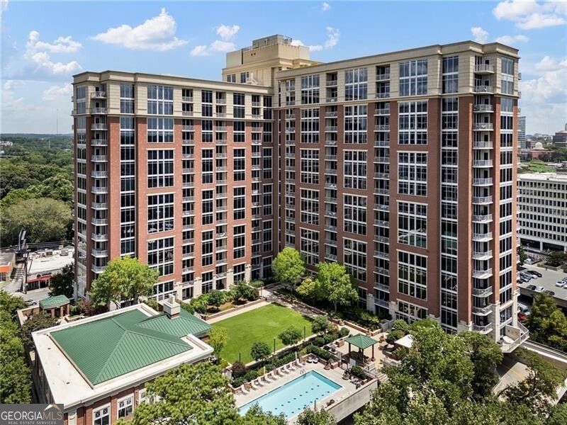 Penthouse Perfection at The Brookwood | 20th Floor Introducing a truly rare offering in one of Atlanta's most coveted buildings-this completely renovated penthouse at The Brookwood soars above the city on the 20th floor, offering sweeping downtown views and over 1,000 square feet of jaw-dropping private terrace space. Every detail of this two-bedroom, three-bath plus den residence has been meticulously reimagined with elevated finishes, clean modern lines, and effortless luxury. The expansive open-concept living space is flooded with natural light, while the sleek chef's kitchen featuring SUB ZERO, WOLF & ASKO appliances opens seamlessly to both indoor and outdoor entertaining areas. With three full designer MARBLE baths, a flexible den or home office, and two spacious bedrooms including a serene primary suite, this is penthouse living redefined. Step outside to your private terrace in the sky, a show-stopping outdoor oasis perfect for dining, lounging, and taking in the glittering cityscape. The Brookwood-Atlanta's first LEED-certified residential building also offers world-class amenities, including 24/7 concierge service, wine storage, pool, doggie park, catering kitchen, clubhouse in an unbeatable South Buckhead location. Just minutes from the best dining, shopping, and entertainment that Sandy Springs and Buckhead have to offer, this home is also conveniently close to major highways, parks, and top-rated schools. Enjoy the perfect combination of luxury, location, and lifestyle in this exceptional new construction home. This amazing unit also includes three parking spaces and a storage space. Welcome to the pinnacle of city living! Call to schedule your private tour today!
