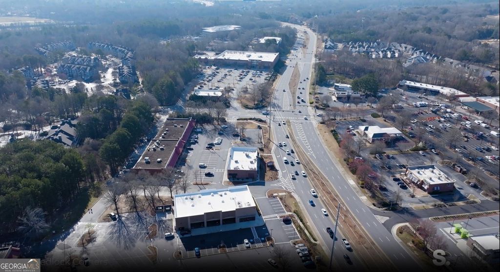 Photo of 5855 State Bridge Road, Johns Creek, GA 30097 (MLS # 10712247)