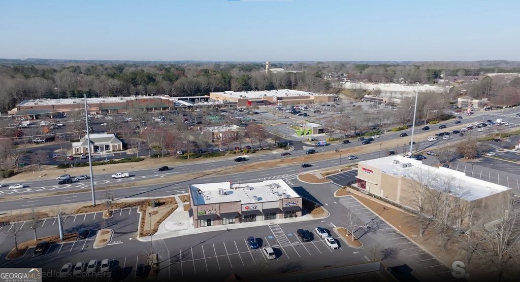 Photo of 5855 State Bridge Road, Johns Creek, GA 30097 (MLS # 10712247)