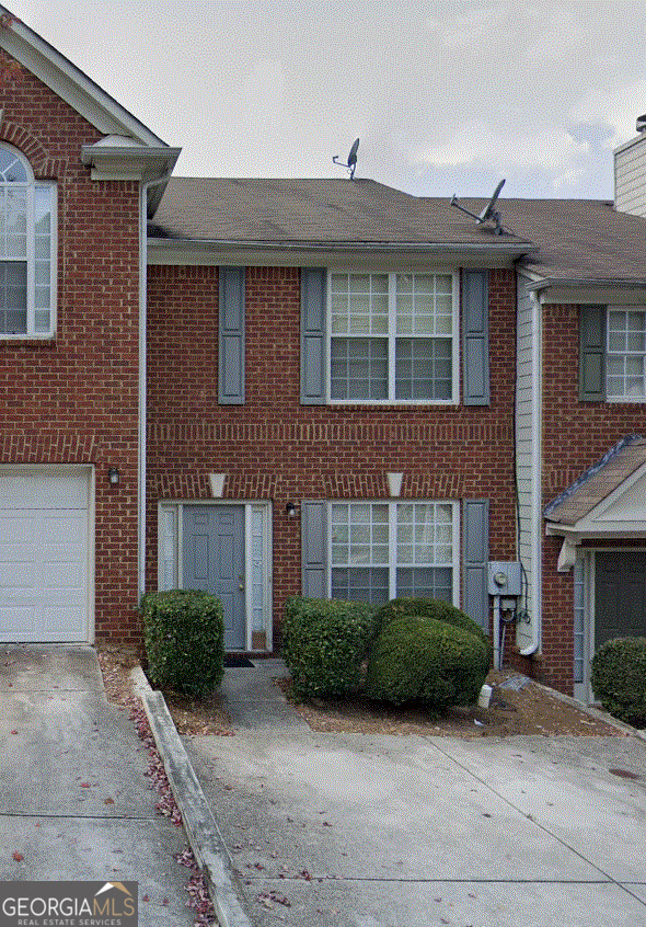 FOR LEASE - SECTION 8 APPROVED! Spacious 2-bedroom townhome! This charming home offers a great floor plan with a well-appointed kitchen, wooden floors, carpeted bedrooms, and fresh paint throughout. Enjoy the convenience of extra rear storage, a brick exterior, and easy access to I-20, I-285, and public transportation right on the bus route. Don't miss this opportunity-schedule your tour today!