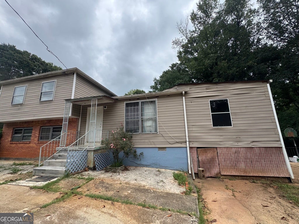 Photo of 6186 HOLIDAY Boulevard, FOREST PARK, GA 30297 (MLS # 10843442)
