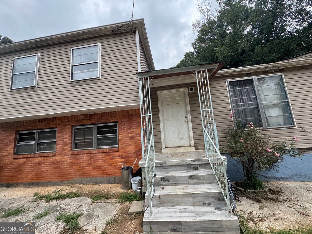 Photo of 6186 HOLIDAY Boulevard, FOREST PARK, GA 30297 (MLS # 10843442)