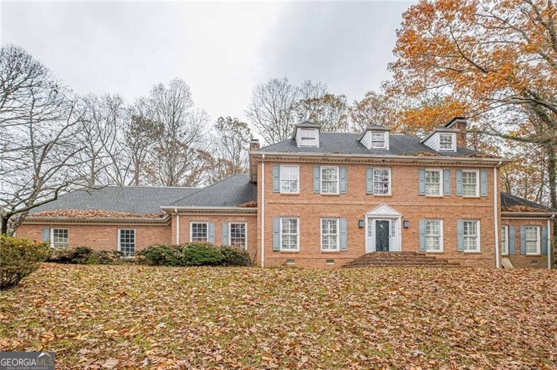 20.37 acres in Buford. Perfect for light industrial right off Peachtree Industrial Blvd. Two homes are included in the sale. The smaller home was built in 1992 and has 4 bedrooms and a crawl space. Twin home is located in the Buford City School District. The larger of the two homes was built in 1973 and is double the size, with a full basement. This home is located in the Lanier High School District. The homes share a driveway. The property is wooded with rolling topography. There is county water, sewer, and power. The larger home is on a septic tank, but the smaller one is on city sewer. This property sits between S. Richland Creek and Little Mill Road. The owners have a separate 2.57-acre parcel at the corner that could also be sold. Inquire with the listing agent. Appointment only. Do not go onto the property without an appointment. This property will not be able to be developed into a subdivision.