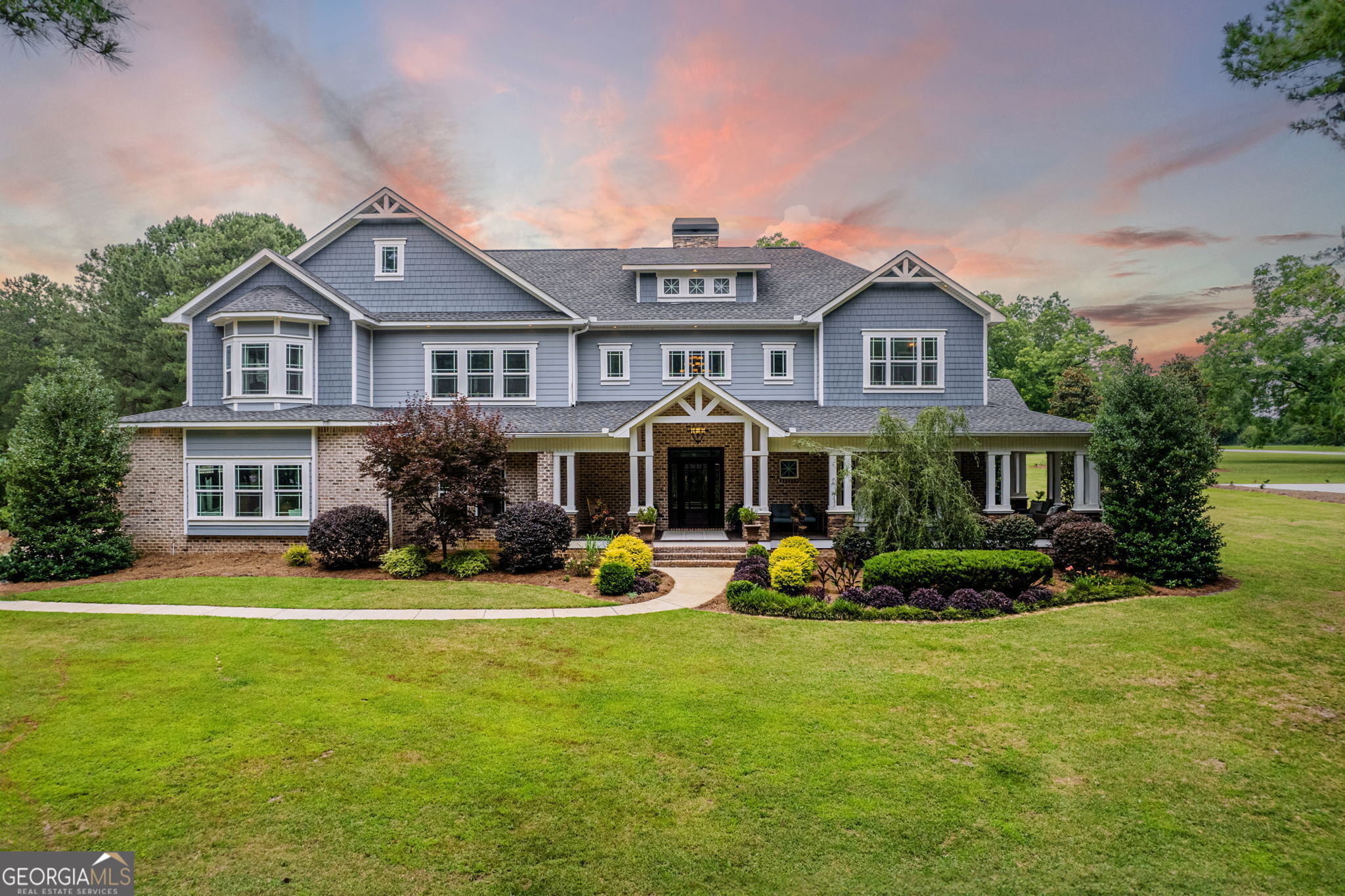 NEW LISTING!! This home has everything and more!2-story custom built home in Indian Creeksubdivision -- a gated community in Perry, GA! If youare looking for 9 acres, designer 54- foot gunite poolwith 2 shallow ends and deep in the middle bydesign with built-in fountains and hot-tub, amazinggarden, pickle ball/basketball court, outdoor firepitsand more -- this is your new home! The outdoorspace can be viewed from almost every room in thehouse and you also get 1500 sq. ft. of covered patioor screened porch along the side of the home toenjoy the outdoor! The list of amazing finishes andupgrades goes on and on. You will love the floor to ceiling wood-burning fireplace with wood crossbeams, beautiful oak hardwoods, custom craftsman hand constructed wood staircase, 3 story great room with open concept gourmet kitchen with gas cook-top, in-wall oven, microwave, granite countertops and farmhouse sink, 2 laundry rooms and so much more! The guest bedroom, hall full bathroom, and office are off the living room. Master ensuite boasts private balcony overlooking the backyard oasis with gas fireplace, his/her separate vanities, large soaking tub, tile walk-in shower, and oversized custom closet! The children's suite upstairs with playroom and custom built-in's is a dream with jack-n-jill bathroom. The second floor laundry room is large with lots of storage and granite countertop too! You truly have to see this home in person to appreciate all the natural light and beauty this home has to offer. You won't find anything pre-fab in this home! The professional landscaping across all the acreage with flowers year round and endless bouquets is irrigated by a well with timed zones. Lets talk about the garden beds-- they are fenced and irrigated with a fruit tree orchard of blueberries, blackberries, strawberries, muscadines, peaches, pears, and more! Don't forget to check out the built-in fire/grilling pit by the pool and a separate camp fire area with tree lights and hammocks! 3 car tandem garage - finished with recessed lighting, custom trim& surround sound system, with enhanced insulated walls and garage doors plus an additional 1 car garage attached that is heated/cooled finished with recessed lighting, custom trim, enhanced insulated walls and garage doors, and electrical upgrades. Schedule your private showing today!