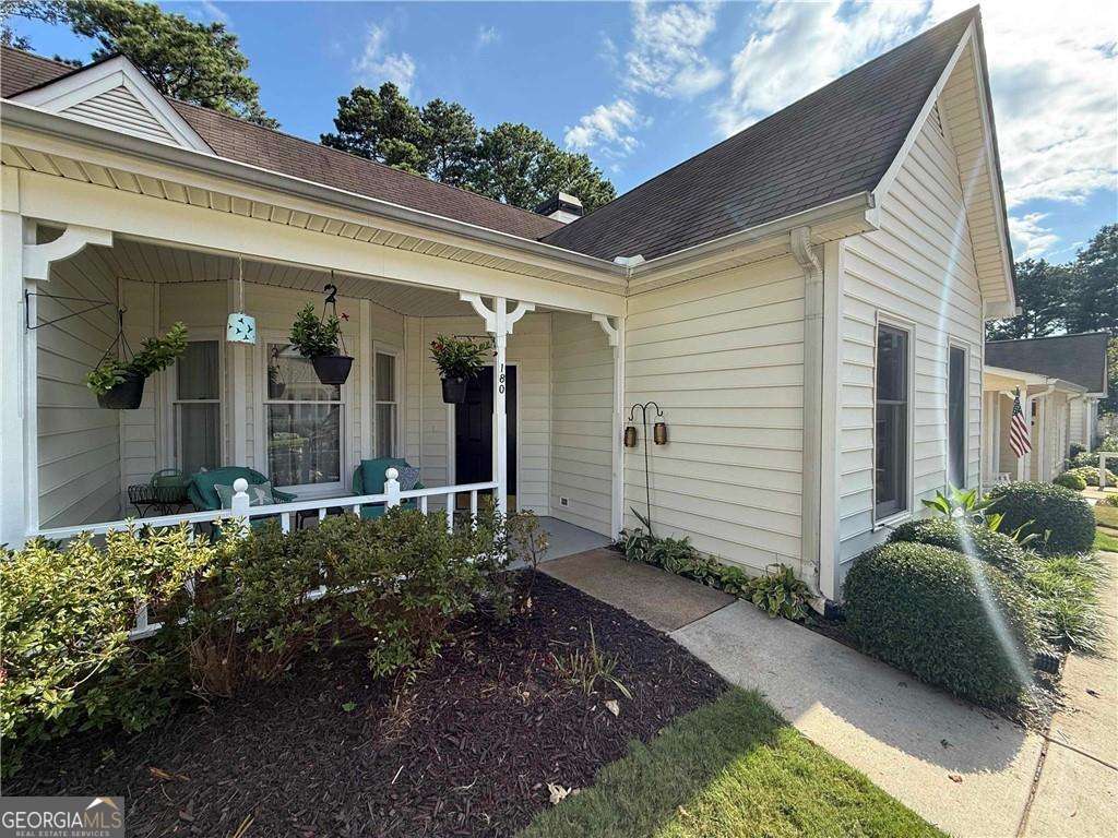 Hidden gem in Roswell, just one mile off Canton street with amazing restaurants, bars, best coffee shops in town. This amazing small community, The Cottages of Roswell is a desirable place to live, being part of a "big" family. One level home with adorable front covered porch, great to have a morning coffee or glass of wine in the evening. This 2 bedroom and a large sunroom/den/office has been totally remodeled. New white cabinets, granite countertops with breakfast bar, stainless steel appliances, gas range and modern fridge. French doors opens to a sun room that leads you to a fully fenced sunny backyard with a patio and plenty of room for flowers/vegetables. Both bedrooms are spacious and each bathroom has been fully remodeled. Master suite has a walk in closet. Close to all shopping, restaurants. Milton and Alpharetta is just a short drive. 0.5 miles is an amazing park with trails, sports courts/tennis courts and a public swimming pool. Amazing place to call home.