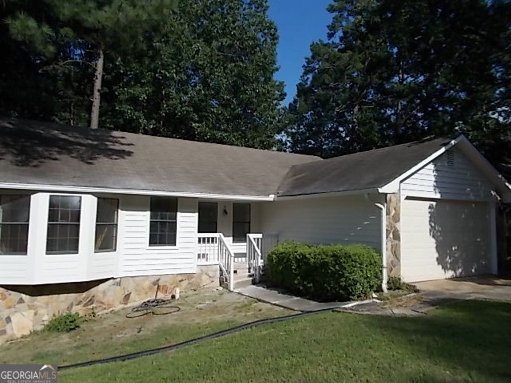 Photo of 697 Pepperwood Trail, Stone Mountain, GA 30087 (MLS # 10758260)