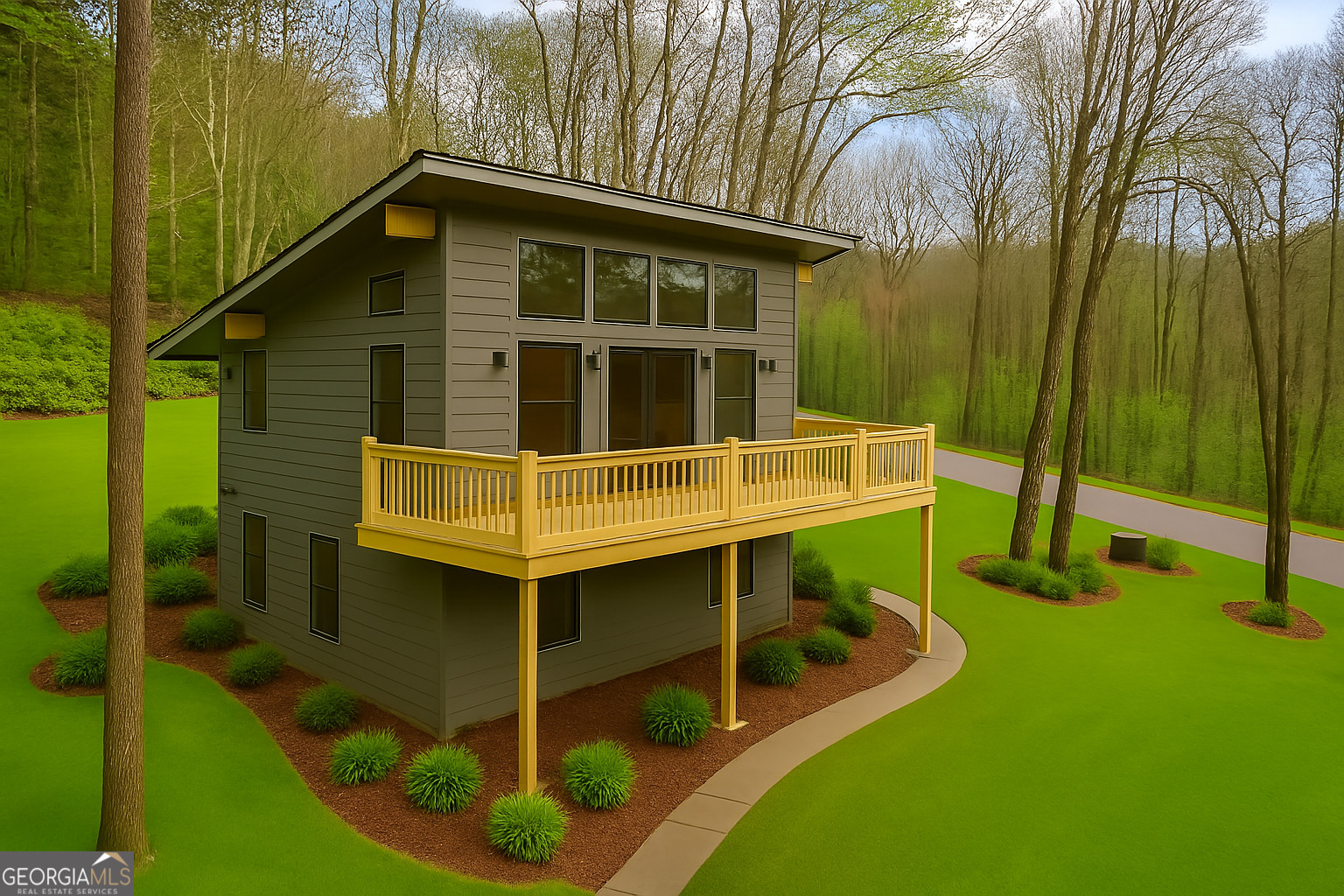 TO-BE-BUILT AT PRE-TARIFF PRICING!! (Lock in the interest rate now or wait until the home is completed based on your perspective on where economic indicators suggest interest rates are heading!) Incredible location in this beautiful, gated community of only thirteen 3- to 5-acre homesites. This 3-bedroom incredible modern mountain home has it all: 2 1/2 baths, vaulted ceilings, and outstanding finishes throughout, PLUS a private 5.02-ACRE wooded lot which will wrap your home with the tranquility of mountain living in a gated community. Gourmet Kitchen has hardwood cabinets and granite countertops, large breakfast bar with seating for entertaining, and includes stainless appliances. Spacious Great Room with vaulted 16' ceilings and modern, high-end electric fireplace offers plenty of space for family events and opens to a large deck that wraps around two sides of the home (approx. 400 sq ft)! Spacious Owner's En Suite features 16' vaulted ceiling, private entrance to deck, huge walk-in closet, double vanity, tiled walk-in shower, and separate water closet. Lower level delivers a large Family Room/Rec Room PLUS two additional Bedrooms with spacious closets AND a full tiled bath. All Bathrooms show hardwood cabinets and granite counter tops. There is still time to pick your colors and finishes! Come and enjoy your morning coffee on the deck as the sun wakes up the forested mountains around you. Close to Lake Burton and abutting a protected national forest, this private community is perfect for the vacation, second, or primary home, or possible income property. Close to downtown Clayton boasting top restaurants, breweries, boutique shopping, wineries, and so much more. The Woods at Waterfall is also close to whitewater rafting, hiking trails, boating, fishing, golf, pickleball, and everything the North Georgia Mountains have to offer. **Due to this being a 5-acre parcel, final home location may impact excavation and driveway cost.** (NOTE: Some attached interior photographs are not representative of this particular model but are intended to showcase possible finishes and features which the builder has incorporated in some of their other builds.) DID YOU NOTICE OUR PRICE IMPROVEMENT?? This house represents our exciting Eagle home on FIVE acres at an incredible turnkey value, with OPTIONS for garage, carport, lower-level deck, and covered upper deck available to be added if desired.